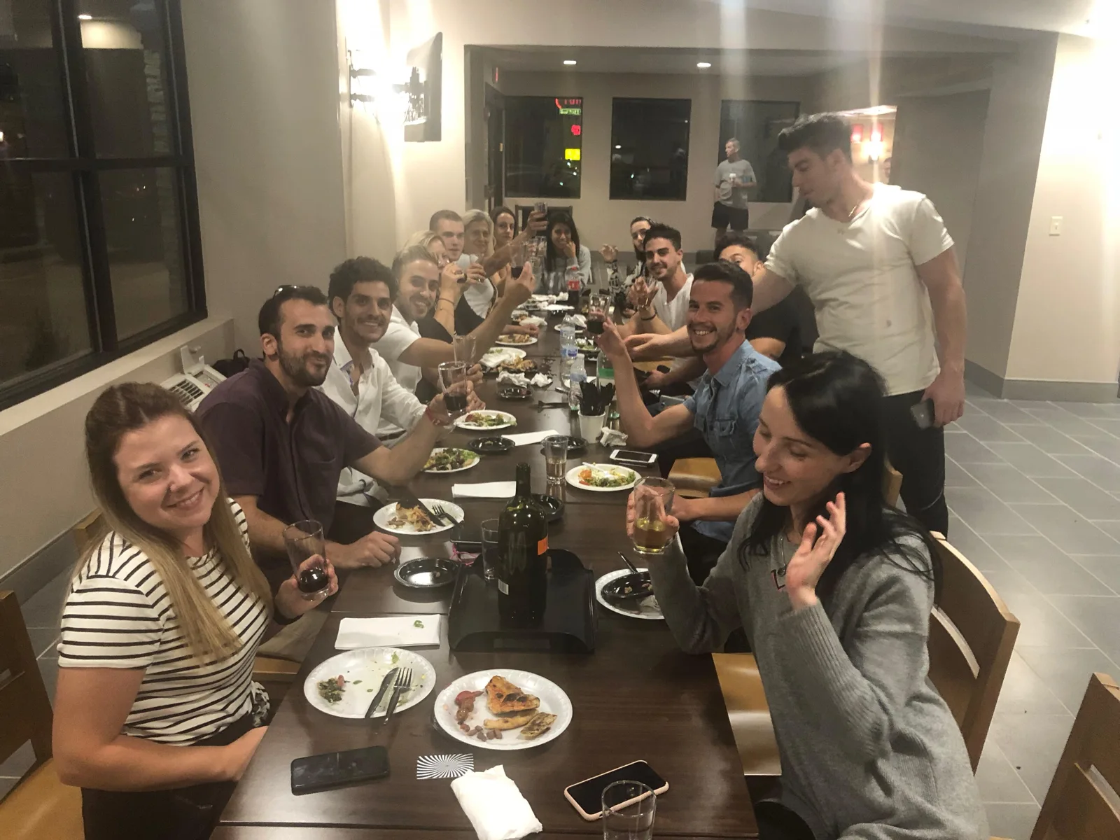 Mazel team sharing dinner together