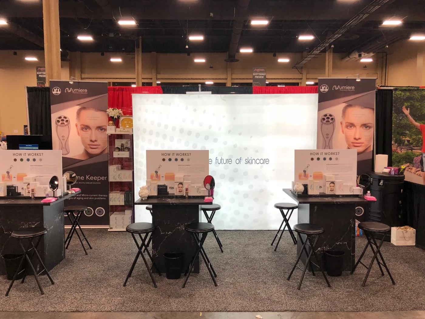 Numiere product display with individual demonstration chairs at Barrett-Jackson Las Vegas in 2018